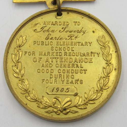 Medal awarded to John Soverby in 1905 for attendance and good conduct