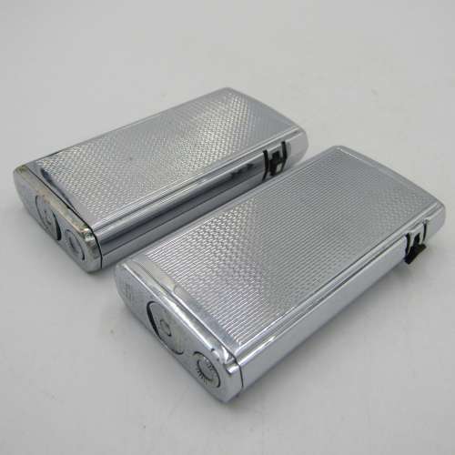 Pair of Ronson Varaflame Electronic pocket lighters - one with SA Airways logo on pouch