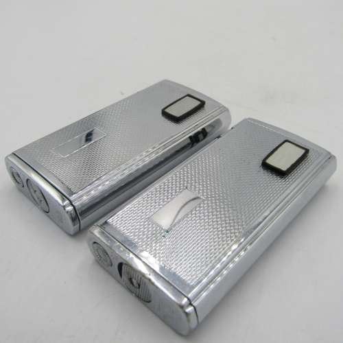 Pair of Ronson Varaflame Electronic pocket lighters - one with SA Airways logo on pouch