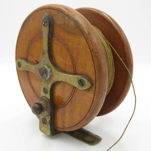 Vintage Wooden fishing reel with bone handles and rachet setting