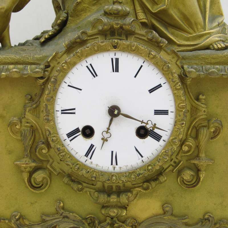 Antique French brass clock with mother and boys under tree