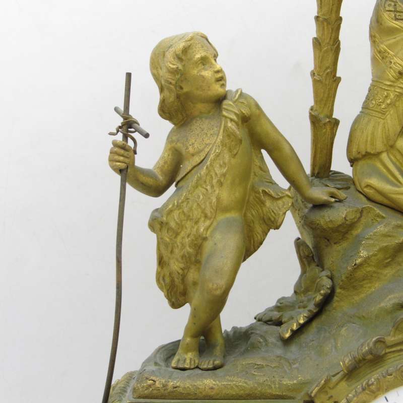 Antique French brass clock with mother and boys under tree
