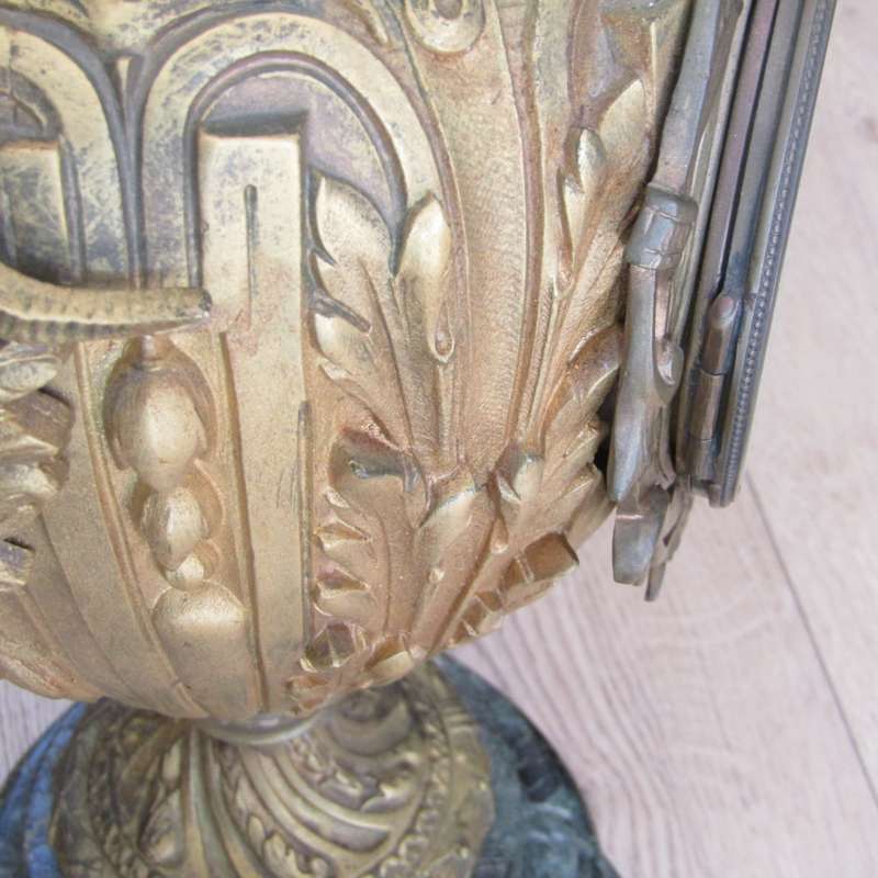 Antique French Ormolu urn clock with stone base