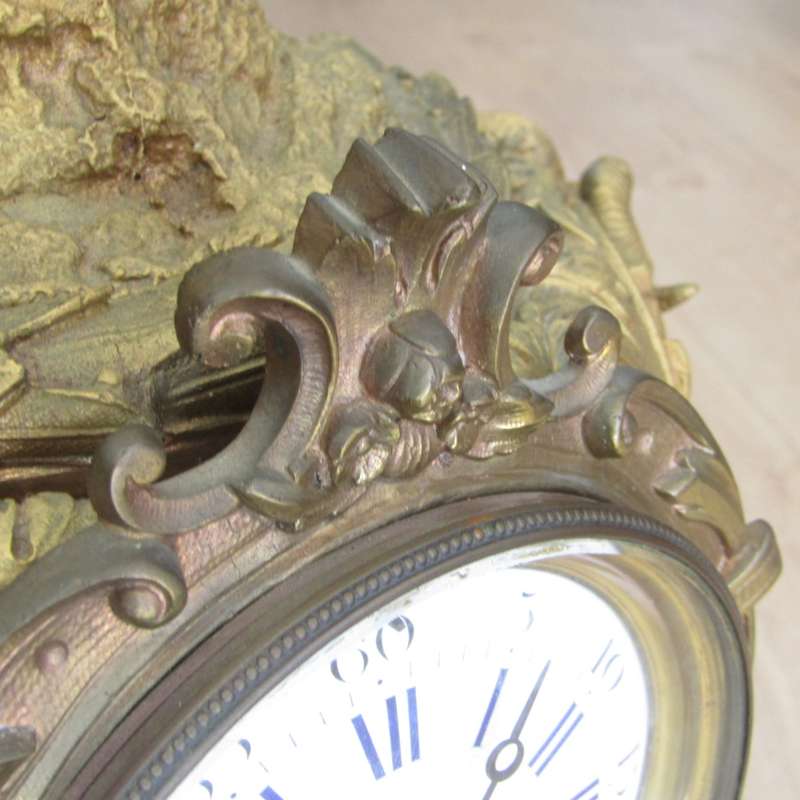 Antique French Ormolu urn clock with stone base