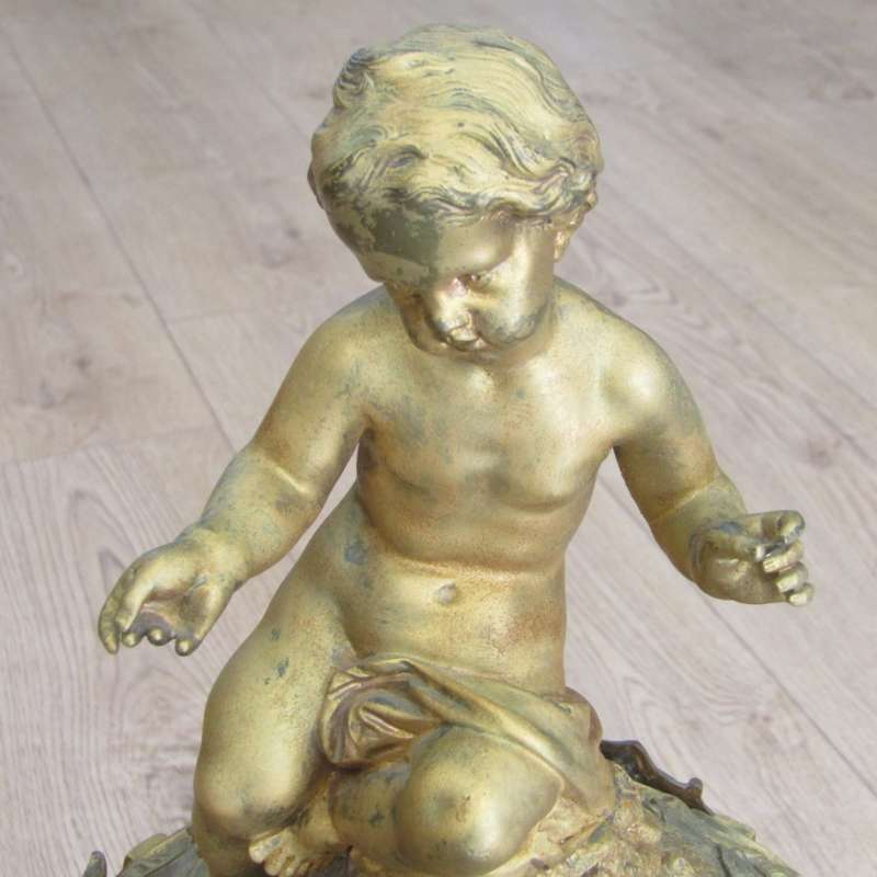 Antique French Ormolu urn clock with stone base