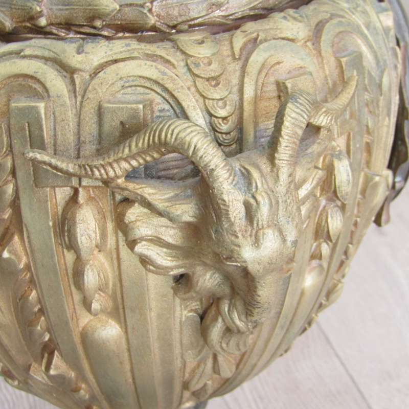 Antique French Ormolu urn clock with stone base