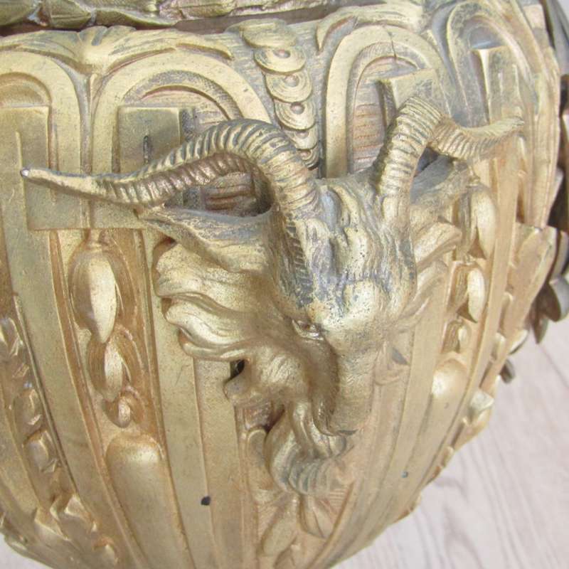 Antique French Ormolu urn clock with stone base