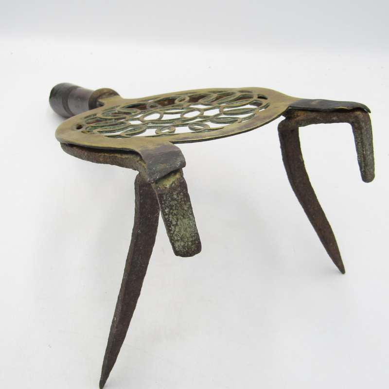 Antique brass and cast iron fireside trivet