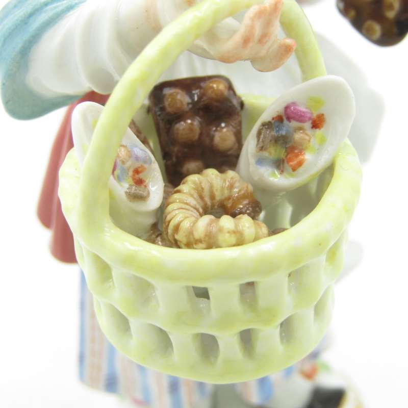 Antique Meissen porcelain figurine of lady with bread basket - small paint chip on bread - 14 cm