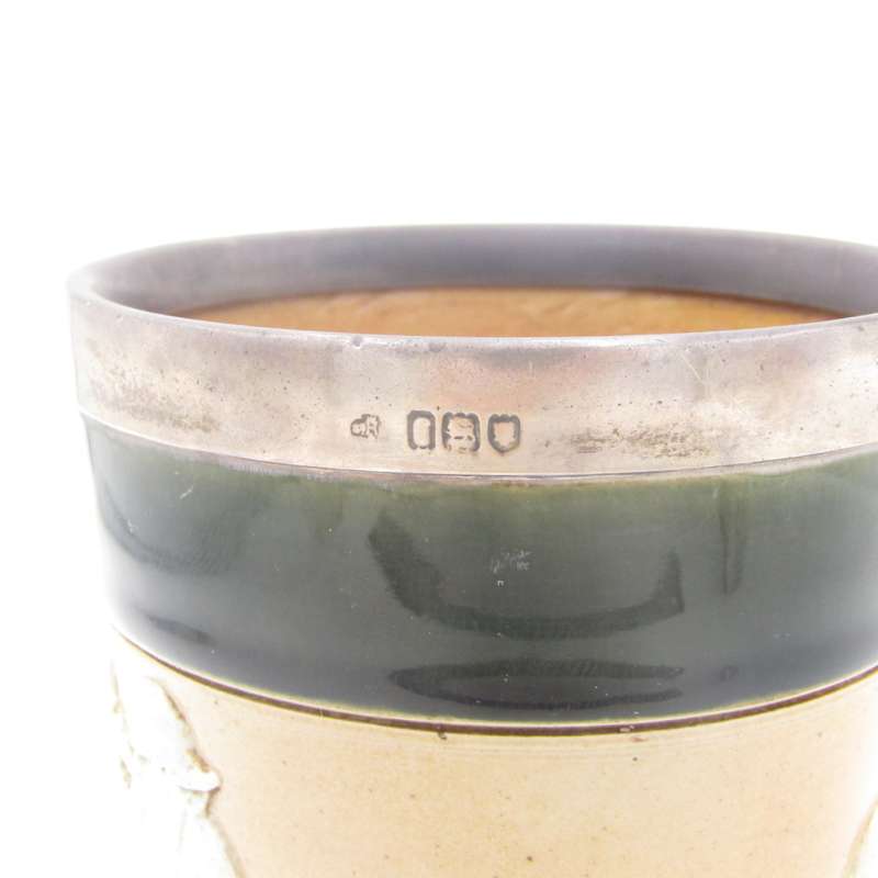 Antique Doulton Lambeth England stoneware tumbler with hallmarked silver rim