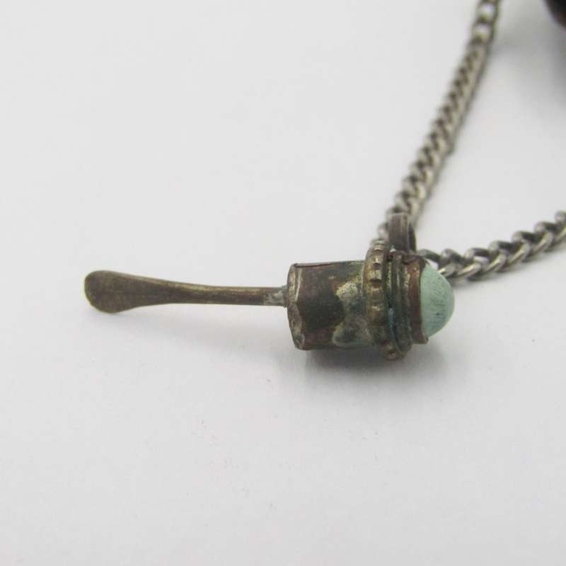 Antique opium bottle with spoon