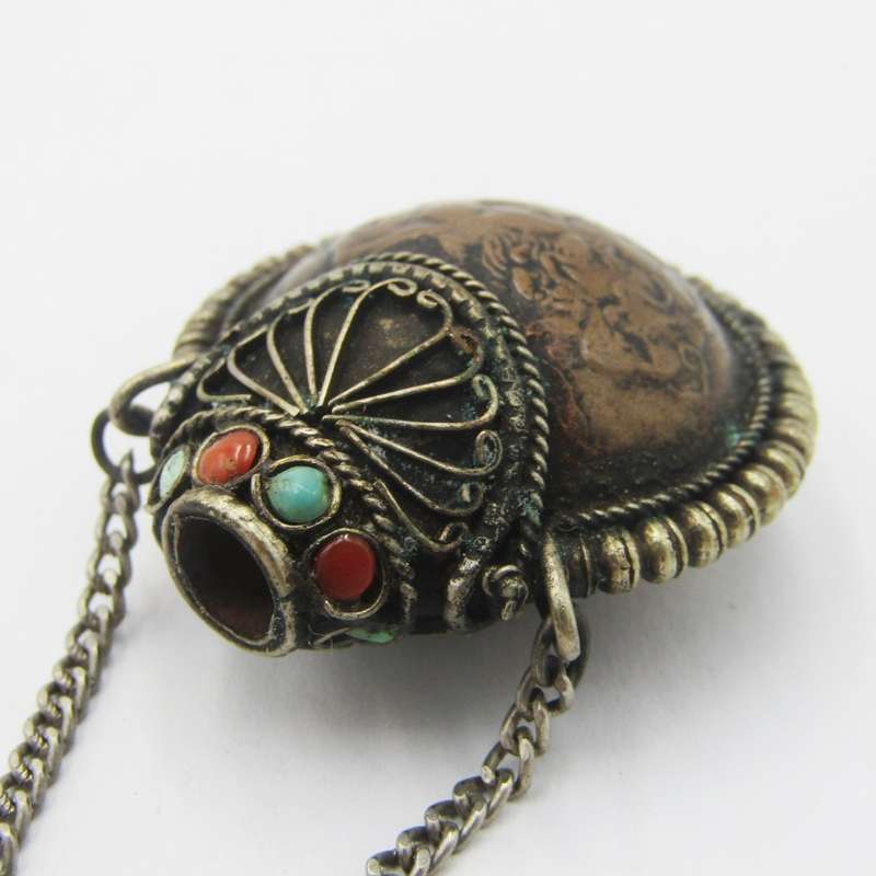 Antique opium bottle with spoon