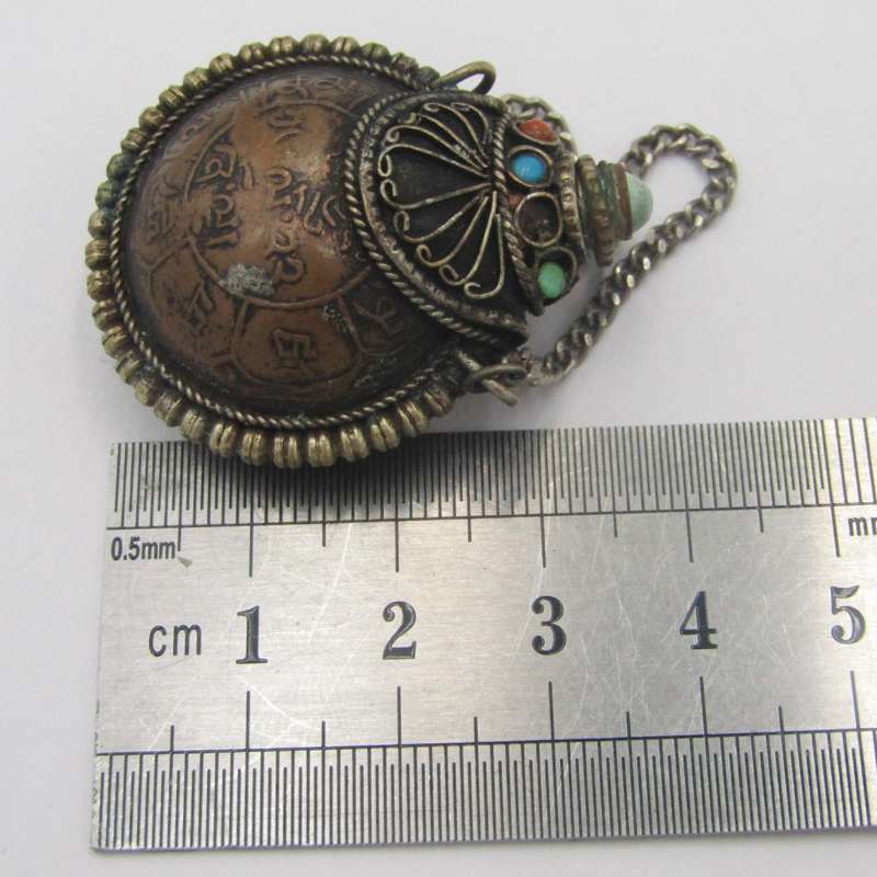 Antique opium bottle with spoon
