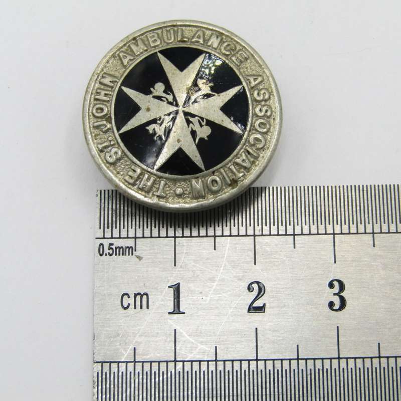 St John`s Ambulance Button hole badge