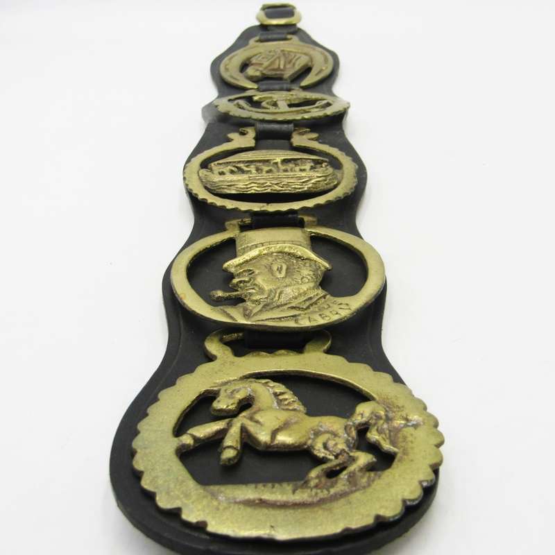 Lot of 5 Horse brasses on leather strap