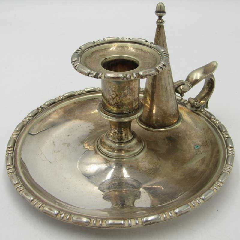 Beautiful vintage silverplated candle holder with snuffer