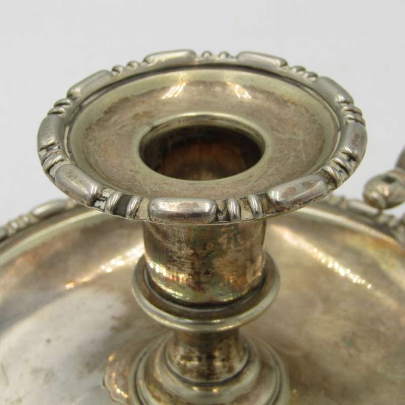 Beautiful vintage silverplated candle holder with snuffer