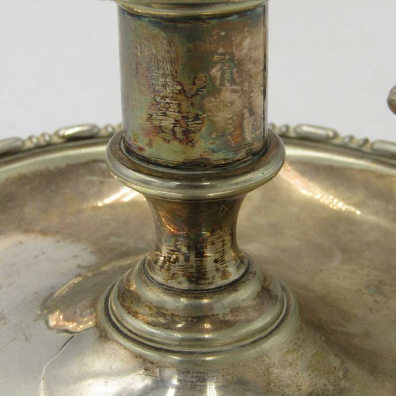 Beautiful vintage silverplated candle holder with snuffer