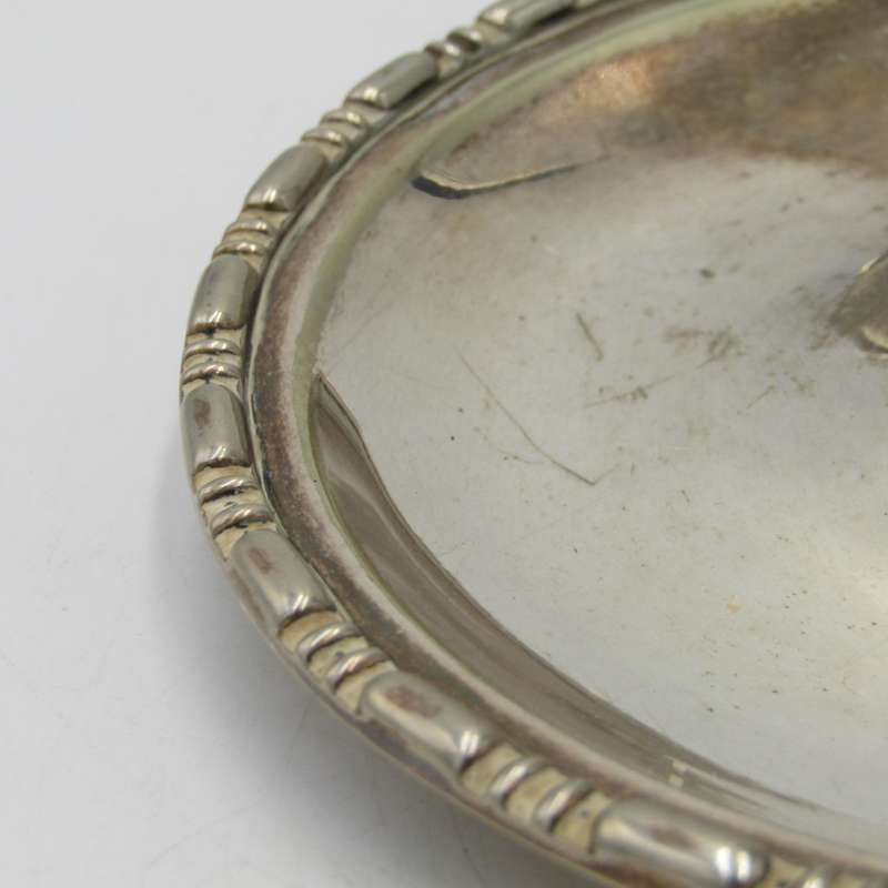 Beautiful vintage silverplated candle holder with snuffer