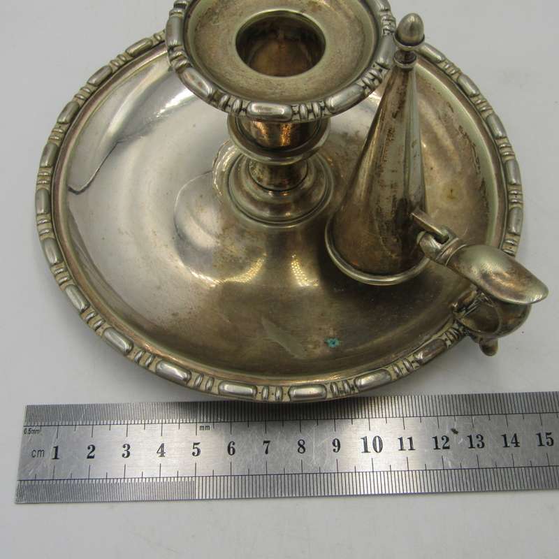 Beautiful vintage silverplated candle holder with snuffer