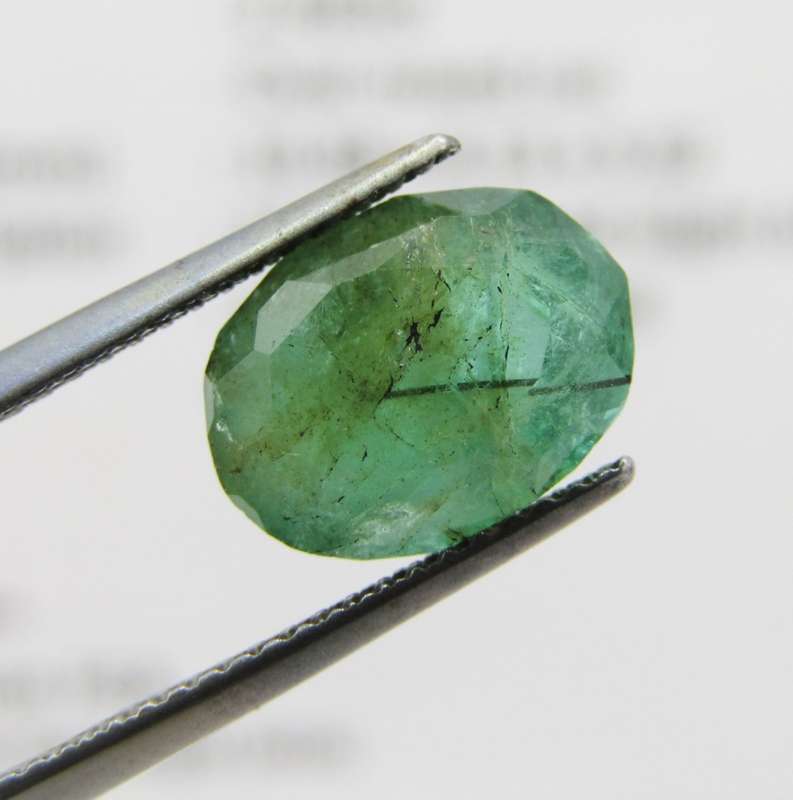 Natural Emerald of 2,99 carat oval mixed cut medium toned slight bluish green