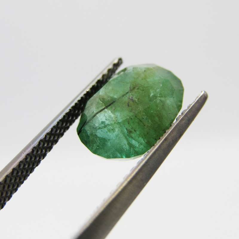 Natural Emerald of 2,99 carat oval mixed cut medium toned slight bluish green