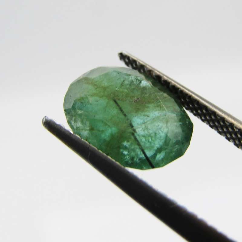 Natural Emerald of 2,99 carat oval mixed cut medium toned slight bluish green