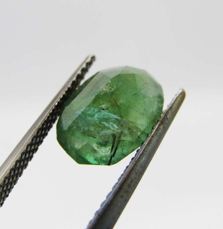 Natural Emerald of 2,99 carat oval mixed cut medium toned slight bluish green