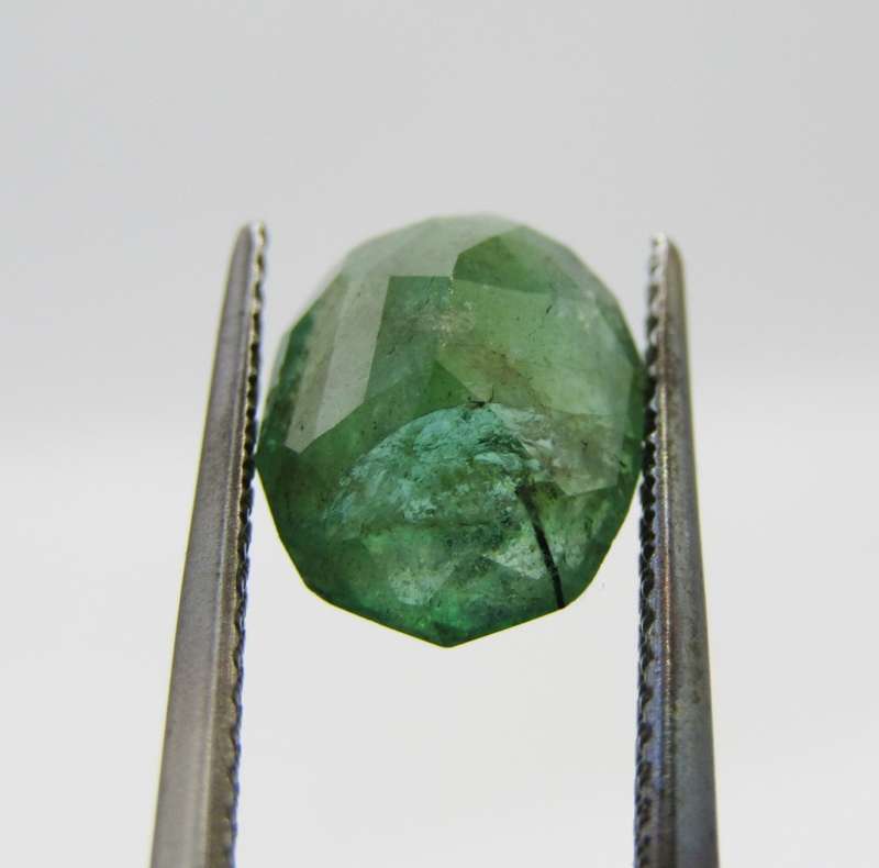 Natural Emerald of 2,99 carat oval mixed cut medium toned slight bluish green