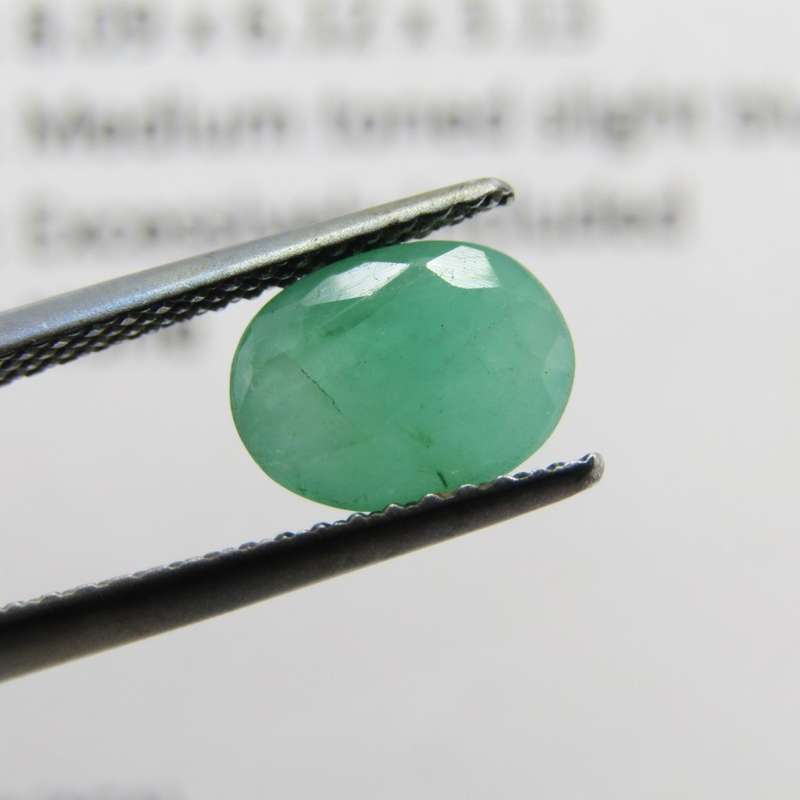 Natural Emerald of 1,14 carat - oval mixed cut  medium toned slight bluish green