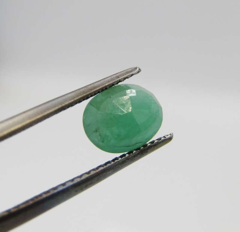 Natural Emerald of 1,14 carat - oval mixed cut  medium toned slight bluish green