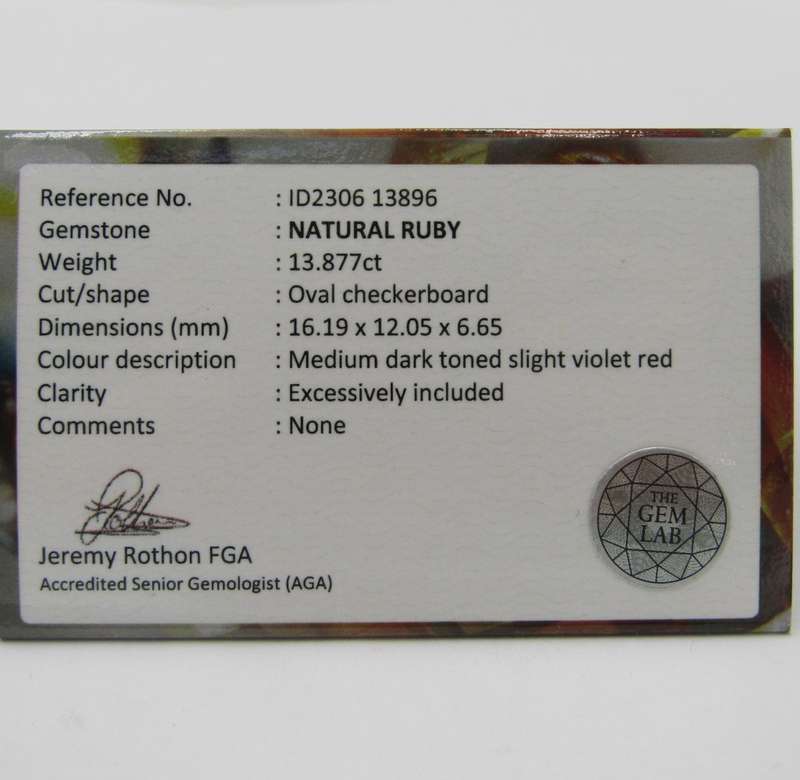 Natural Ruby of 13,8 carat oval checkerboard dark toned slight violet red with Gemlab certificate