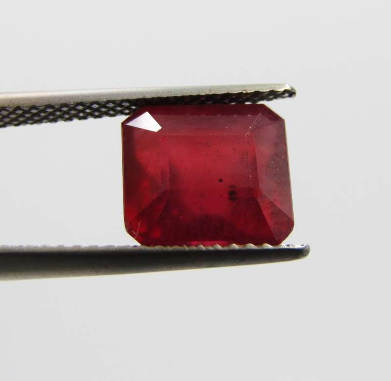 Fracture filled Ruby of 5,5 carat medium dark toned red Emerald cut with Gemlab certificate