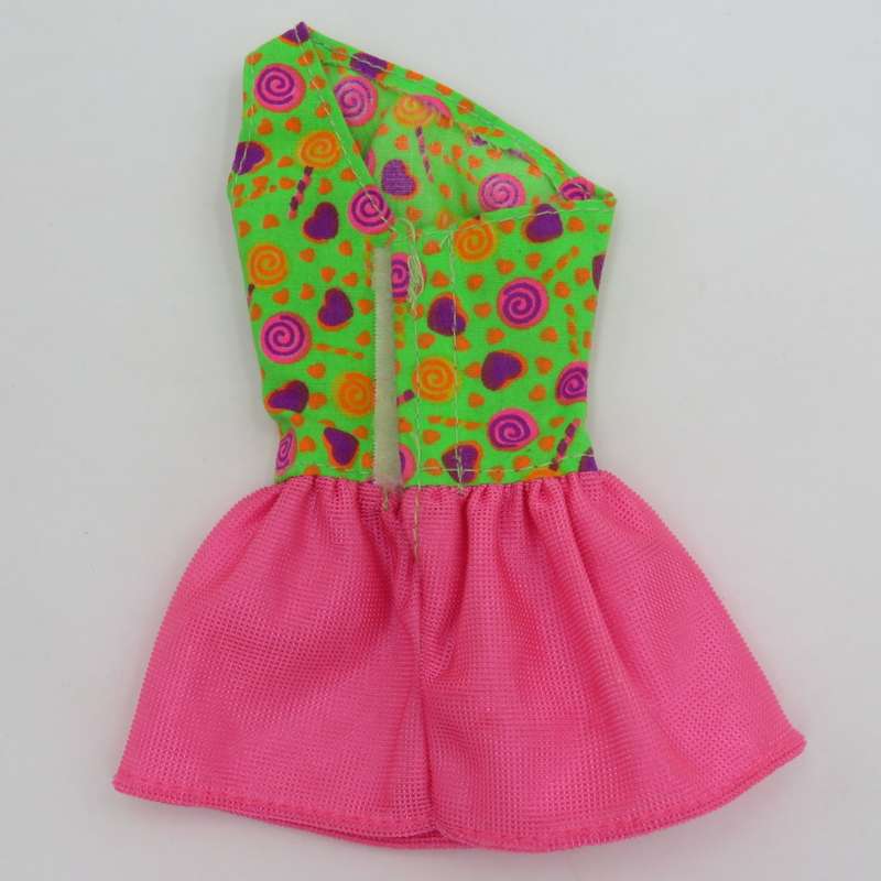 Lot of Barbie doll clothing and accessories