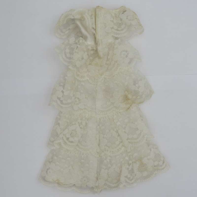 Lot of Barbie doll clothing and accessories