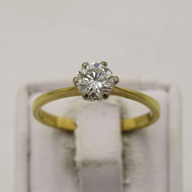 18kt Yellow gold diamond ring with 0,60ct diamond - weight 2,6g - size N 1/2