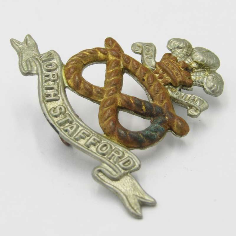 North Staffordshire regiment cap badge with lugs