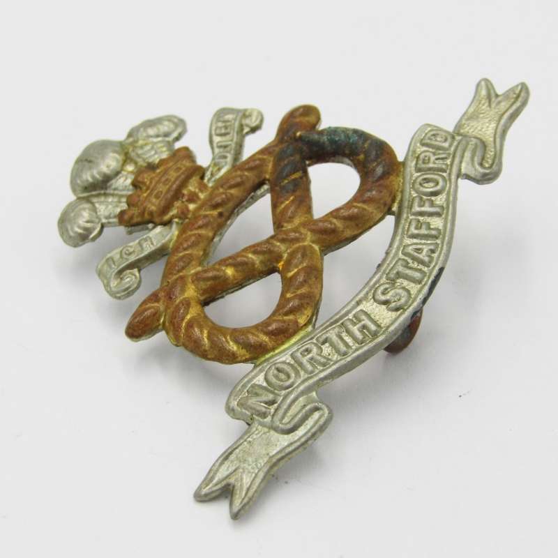 North Staffordshire regiment cap badge with lugs