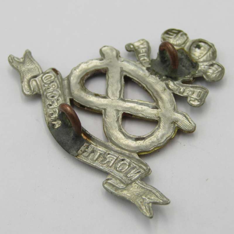 North Staffordshire regiment cap badge with lugs
