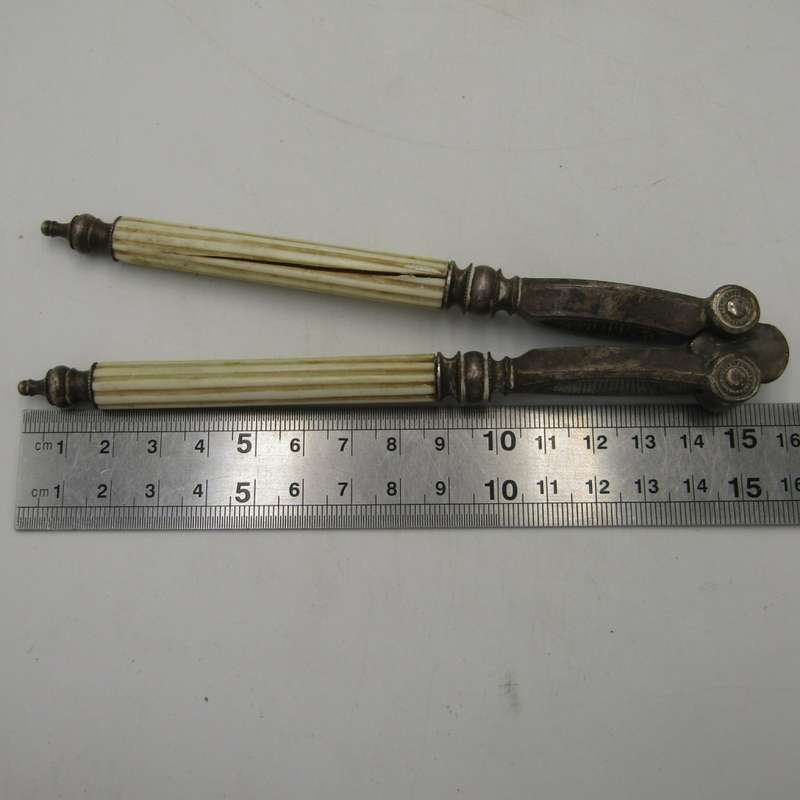 Antique nutcracker with imitation ivory handles
