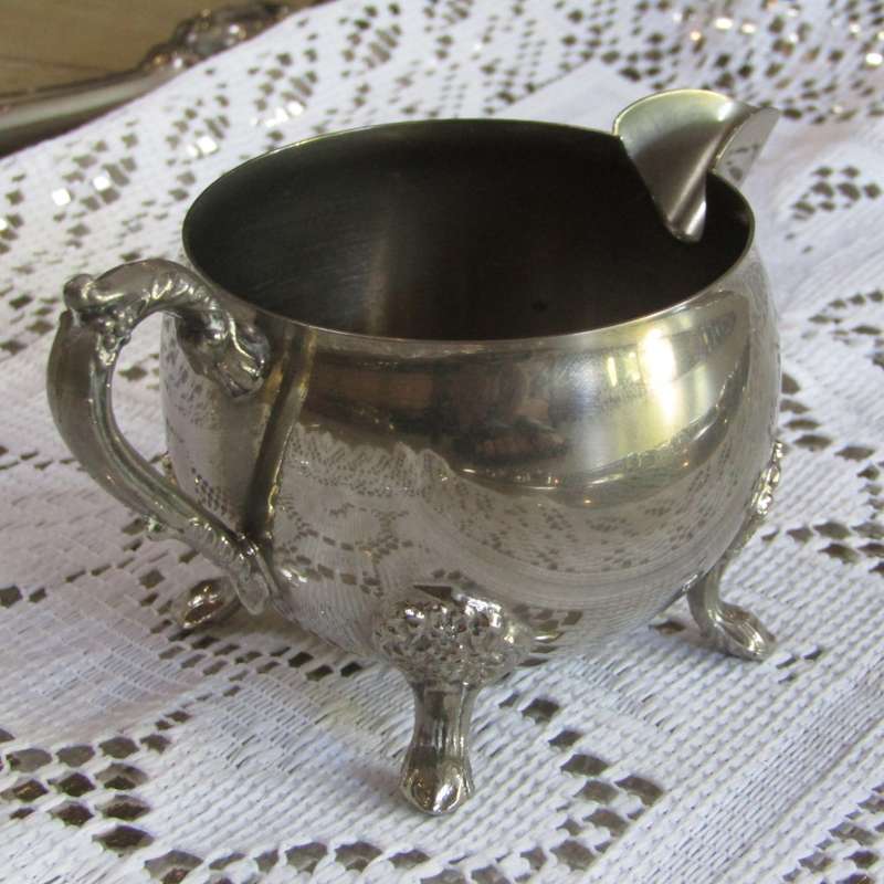 Vintage silverplated tea and coffee set on tray