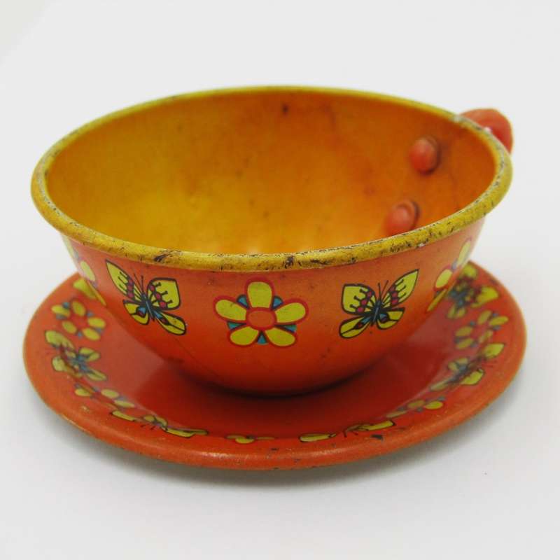 Pair of vintage tinplate doll house cups and saucers