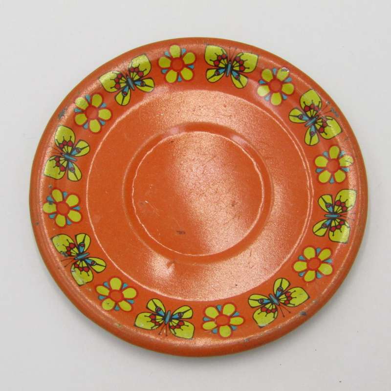 Pair of vintage tinplate doll house cups and saucers