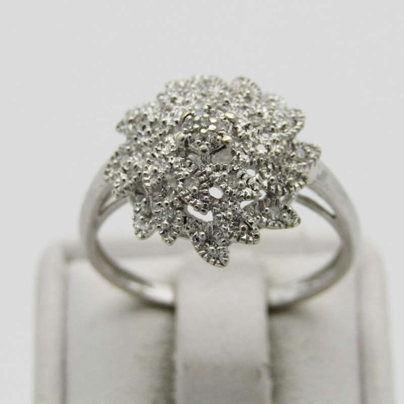 9kt White gold ring with about 30 small diamonds - ring size P