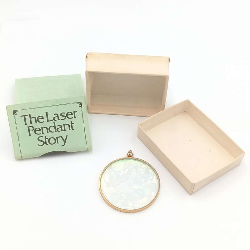 Vintage Hologram pendant with The Laser pendant story