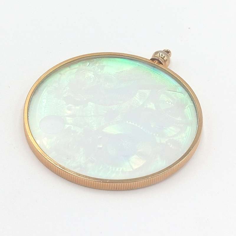 Vintage Hologram pendant with The Laser pendant story