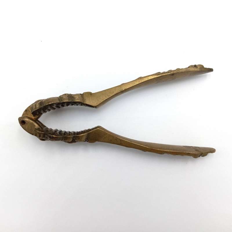 Antique brass nutcracker