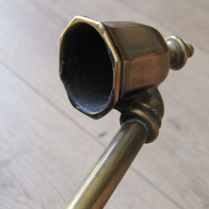 Very long antique brass candle snuffer