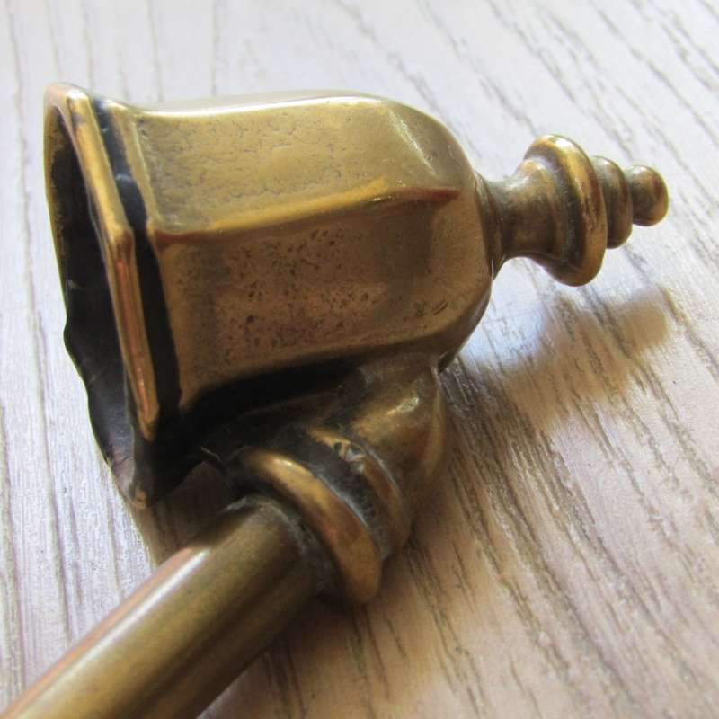 Very long antique brass candle snuffer