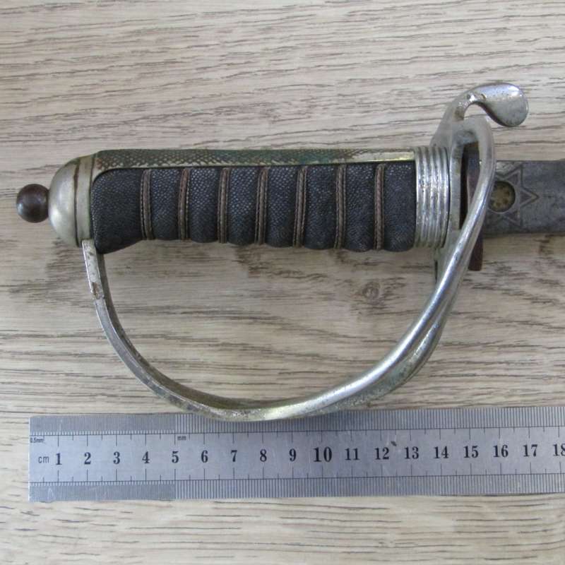Royal Artillery sword in leather sleeve who belonged to TEJ St Vaughan